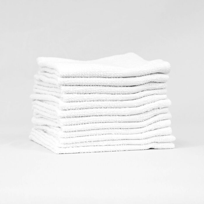 Stack of 12x12 Economy White Washcloths in Bulk