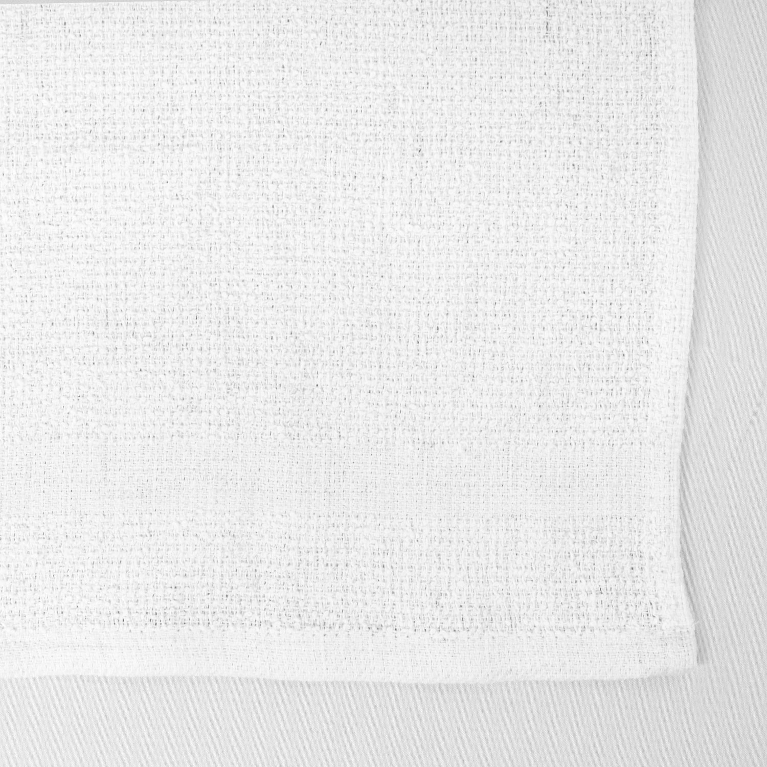 Closeup of 12x12 Economy White Washcloths in Bulk