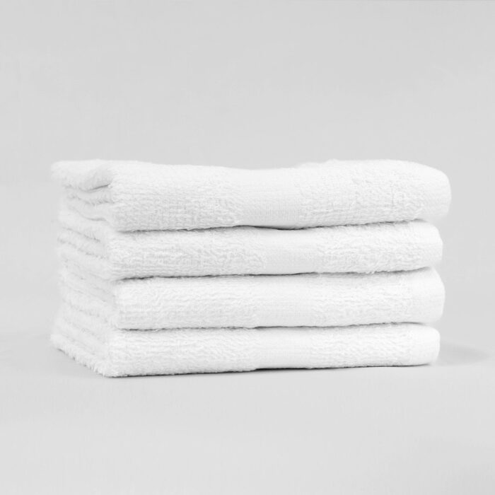 Stack of 15x25 Economy White Hand Towels in Bulk