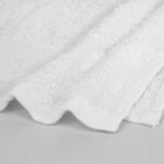 Closeup of 15x25 Economy White Hand Towels in Bulk