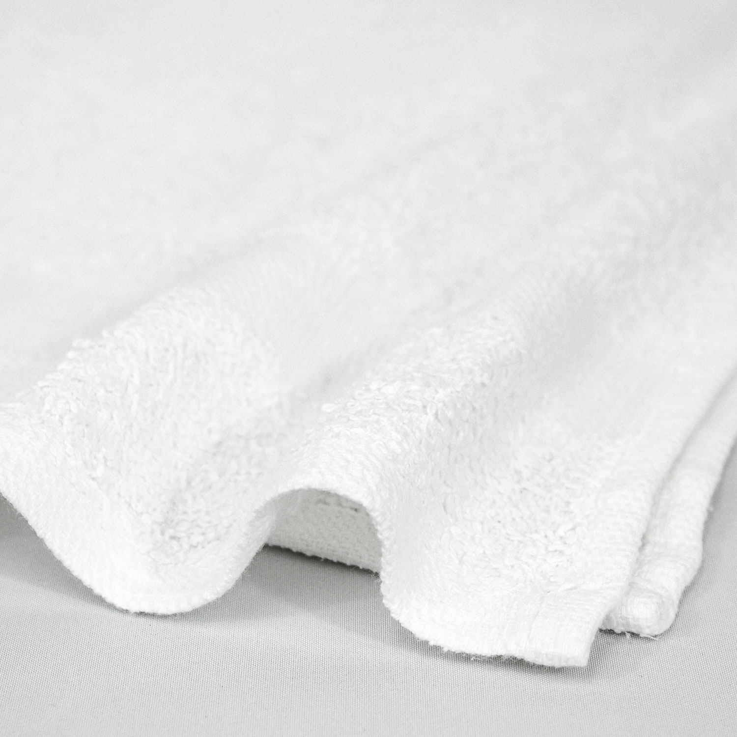 Closeup of 16x27 Economy White Hand Towels