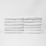 Stack of 16x27 Economy White Hand Towels