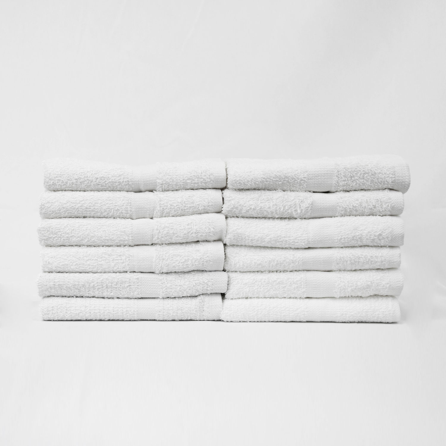 Stack of 16x27 Economy White Hand Towels