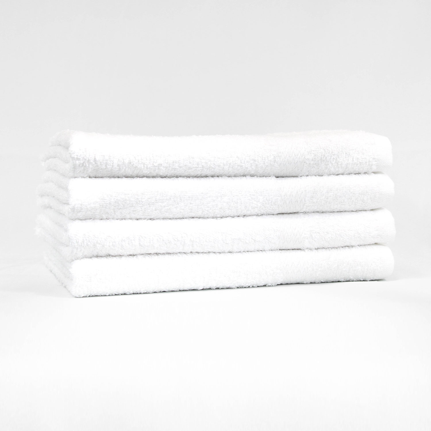 Stack of 22x44 Premium White Gym Towels