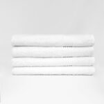 Stack of 27x54 Premium White Bath Towels - 14lbs/dz