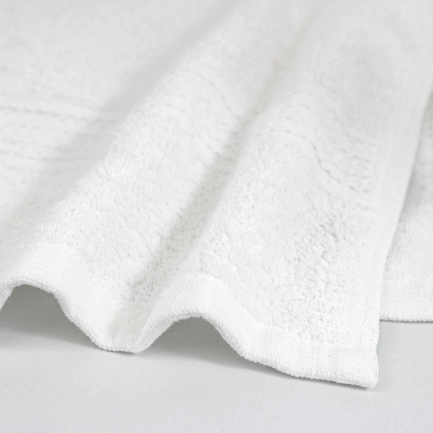 Closeup of 27x54 Premium White Bath Towels - 14lbs/dz