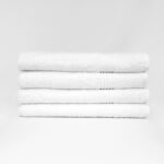 Stack of 27x54 Premium White Bath Towels